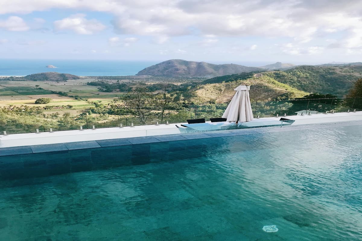 Beautiful beach view in Kuta Lombok showing turquoise water and scenic coastline